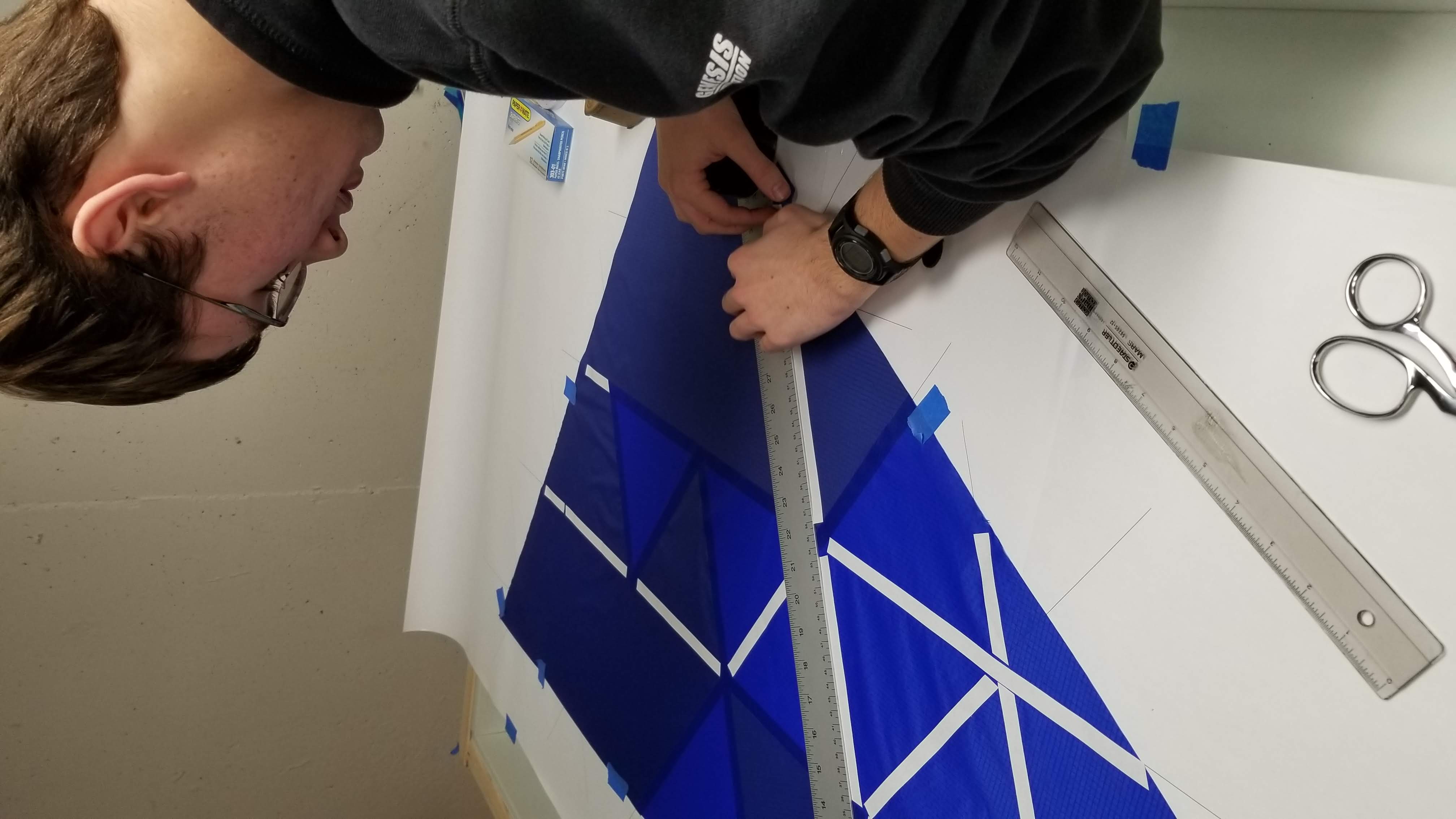 Taping fabric for the sail